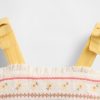 Babykleid mit Stickerei und Schulterschnürung Babykleid mit Stickerei und Schulterschnürung