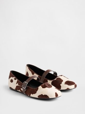 Ballerinas aus Kalbshaar mit Kuhprint
