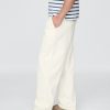Gap × DÔEN Jeanshose mit Bundfalten für Erwachsene