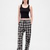 Gap × Disney – Flanell-Pyjamahose mit Totenkopfmotiv für Erwachsene „The Nightmare Before Christmas“ von Tim Burton Gap × Disney – Flanell-Pyjamahose mit Totenkopfmotiv für Erwachsene „The Nightmare Before Christmas“ von Tim Burton