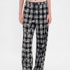 Gap × Disney – Flanell-Pyjamahose mit Totenkopfmotiv für Erwachsene „The Nightmare Before Christmas“ von Tim Burton Gap × Disney – Flanell-Pyjamahose mit Totenkopfmotiv für Erwachsene „The Nightmare Before Christmas“ von Tim Burton