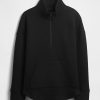 GapFit – Gesteppter Jacquard-Pullover mit halbem Reißverschluss GapFit – Gesteppter Jacquard-Pullover mit halbem Reißverschluss