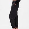GapFit Tech Jogginghose mit hohem Bund und Reißverschluss am Saum GapFit Tech Jogginghose mit hohem Bund und Reißverschluss am Saum