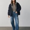 Hoch geschnittene Barrel-Jeans