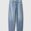 Hoch sitzende Crossover-Jeans