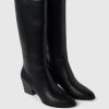 Hohe Stiefel aus veganem Leder mit Absatz Hohe Stiefel aus veganem Leder mit Absatz