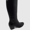 Hohe Stiefel aus veganem Leder mit Absatz Hohe Stiefel aus veganem Leder mit Absatz