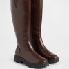 Hohe Stiefel aus veganem Leder mit Profilsohle