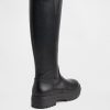 Hohe Stiefel aus veganem Leder mit Profilsohle