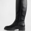Hohe Stiefel aus veganem Leder mit Profilsohle