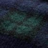 Karierter Pullover mit V-Ausschnitt Karierter Pullover mit V-Ausschnitt