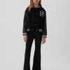 Kinder High Rise Crossover Schlagjeans im 70er-Jahre-Stil