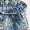 Kinder Jeans mit Blumenmuster und Baggy-Jeans Kinder Jeans mit Blumenmuster und Baggy-Jeans