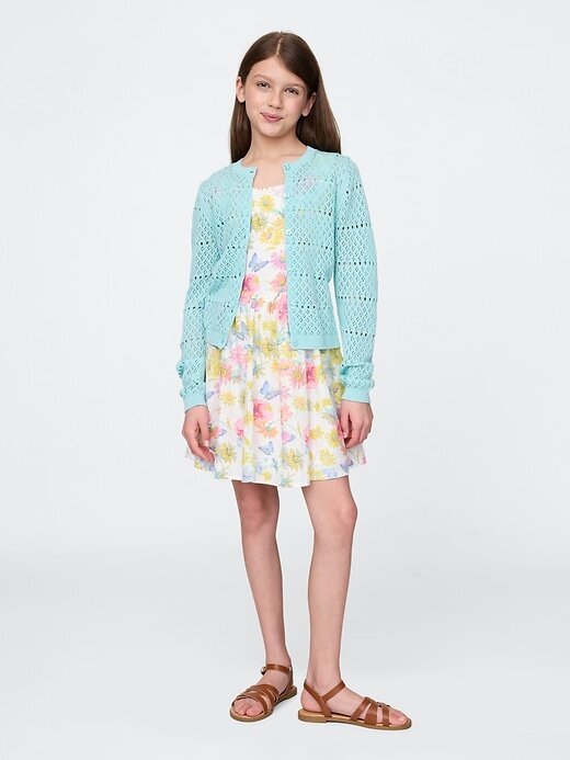 Kinderkleid aus Leinen-Baumwolle mit Blumenmuster Kinderkleid aus Leinen-Baumwolle mit Blumenmuster