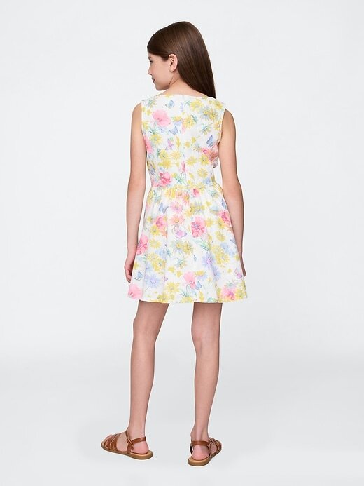 Kinderkleid aus Leinen-Baumwolle mit Blumenmuster Kinderkleid aus Leinen-Baumwolle mit Blumenmuster