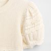 Kinderpullover mit gewelltem Muster und verschiedenen Maschen