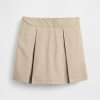 Kinderuniform, plissierter Khaki-Skort Kinderuniform, plissierter Khaki-Skort