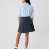 Kinderuniform, plissierter Khaki-Skort Kinderuniform, plissierter Khaki-Skort