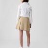 Kinderuniform, plissierter Khaki-Skort Kinderuniform, plissierter Khaki-Skort