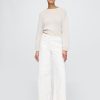 Knöchellange Jeans mit weitem Bein und hohem Bund Knöchellange Jeans mit weitem Bein und hohem Bund