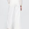 Knöchellange Jeans mit weitem Bein und hohem Bund Knöchellange Jeans mit weitem Bein und hohem Bund