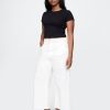 Knöchellange Jeans mit weitem Bein und hohem Bund Knöchellange Jeans mit weitem Bein und hohem Bund