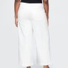 Knöchellange Jeans mit weitem Bein und hohem Bund Knöchellange Jeans mit weitem Bein und hohem Bund