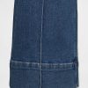 Knöchellange Jeans mit weitem Bein und hohem Bund Knöchellange Jeans mit weitem Bein und hohem Bund