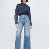 Knöchellange Jeans mit weitem Bein und hohem Schritt Knöchellange Jeans mit weitem Bein und hohem Schritt