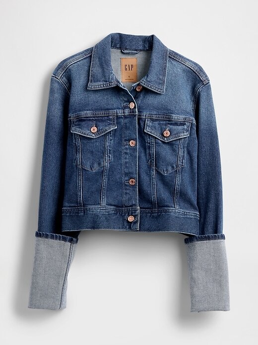 Kurze Jeansjacke mit Nadelmanschetten und Symbol Kurze Jeansjacke mit Nadelmanschetten und Symbol