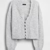 Kurzer Cardigan aus flauschigem Pointelle-Gewellt Kurzer Cardigan aus flauschigem Pointelle-Gewellt