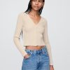 Kurzer Cardigan mit geflochtener Rippe Kurzer Cardigan mit geflochtener Rippe