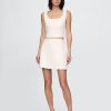 Kurzes Top aus Leinenmischung mit Wellenkante Kurzes Top aus Leinenmischung mit Wellenkante