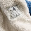 Kuscheliger Baby-Einteiler aus gestepptem Denim Kuscheliger Baby-Einteiler aus gestepptem Denim