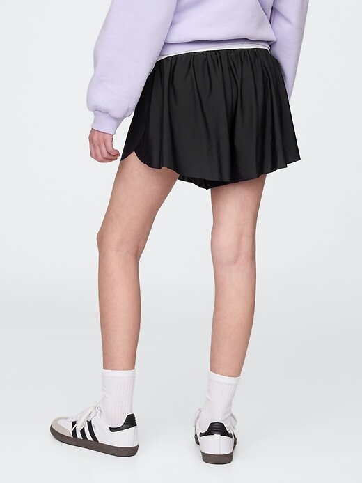 Laufshorts mit Schmetterlingssaum für Kinder Laufshorts mit Schmetterlingssaum für Kinder
