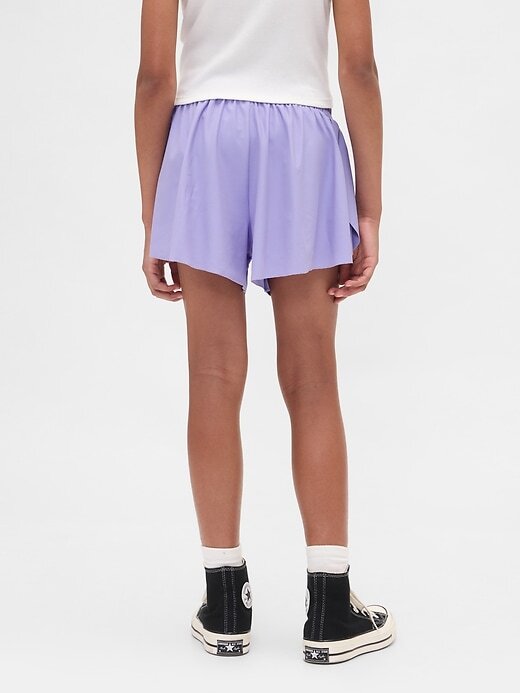 Laufshorts mit Schmetterlingssaum für Kinder Laufshorts mit Schmetterlingssaum für Kinder