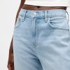 Lockere, gerade geschnittene Jeans mit hohem Bund Lockere, gerade geschnittene Jeans mit hohem Bund