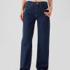 Lockere Jeans im Stil der 90er mit mittelhohem Bund Lockere Jeans im Stil der 90er mit mittelhohem Bund