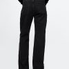 Lockere Jeans im Stil der 90er mit mittelhohem Bund Lockere Jeans im Stil der 90er mit mittelhohem Bund