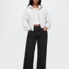 Lockere Jeans im Stil der 90er mit mittelhohem Bund Lockere Jeans im Stil der 90er mit mittelhohem Bund