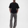 Lockere Zimmermannsjeans im 90er-Jahre-Stil Lockere Zimmermannsjeans im 90er-Jahre-Stil
