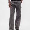 Lockere Zimmermannsjeans im 90er-Jahre-Stil Lockere Zimmermannsjeans im 90er-Jahre-Stil