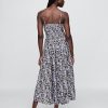 Maxikleid mit Blumenmuster und V-Ausschnitt Maxikleid mit Blumenmuster und V-Ausschnitt