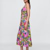 Maxikleid mit Blumenmuster und V-Ausschnitt Maxikleid mit Blumenmuster und V-Ausschnitt