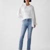 Mid Rise Vintage Slim Jeans mit geteiltem Saum Mid Rise Vintage Slim Jeans mit geteiltem Saum