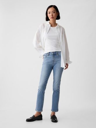 Mid Rise Vintage Slim Jeans mit geteiltem Saum
