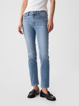 Mid Rise Vintage Slim Jeans mit geteiltem Saum