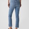 Mid Rise Vintage Slim Jeans mit geteiltem Saum Mid Rise Vintage Slim Jeans mit geteiltem Saum