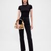 Mini-Slouchy-Tasche aus Kalbshaar mit Kuh-Print