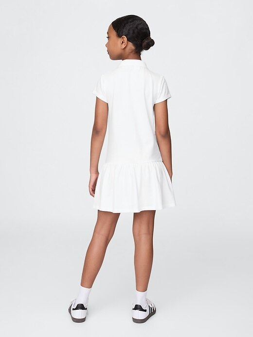 Polokleid mit tiefer Taille für Kinder Polokleid mit tiefer Taille für Kinder